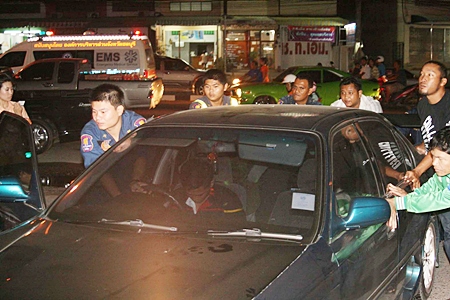 Rescue workers can’t wake him, so they push his car to the side of the road and wait for relatives to come collect him.